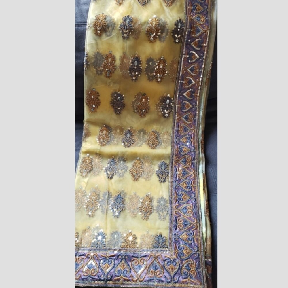 Gorgeous Mustard Yellow and Lilac Purple Net Saree